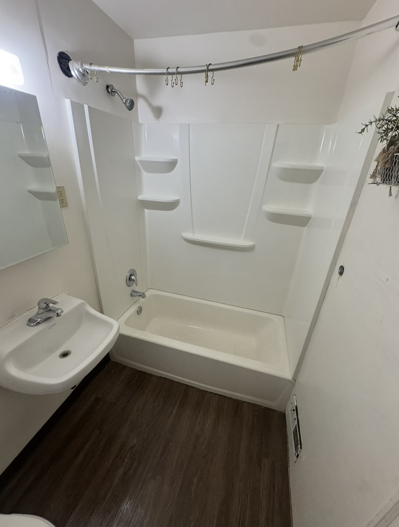 Bathroom after cleaning - sparkling clean tub and fixtures